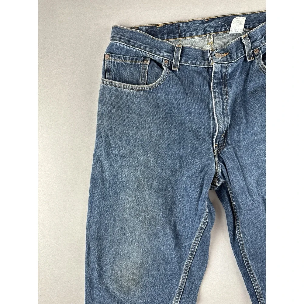 Vintage Levi's 560 Loose Tapered Jeans 34x30 Medium Wash Made In USA